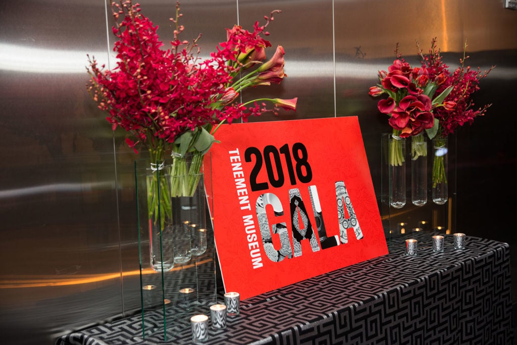 Gala 2018 sign on a table with flowers