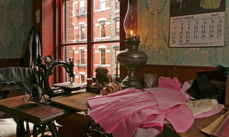 The Levine sewing table inside the parlor of their recreated apartment at 97 Orchard Street