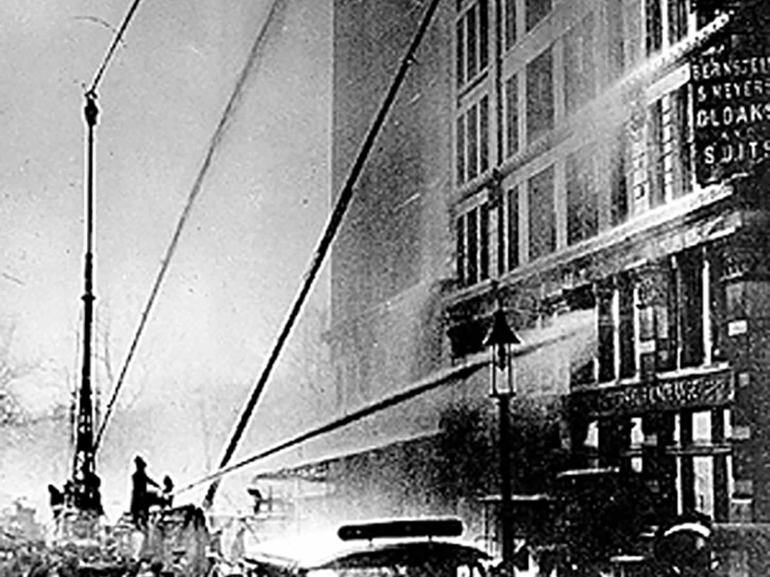 Firefighters spraying water in the Triangle Factory in 1911.