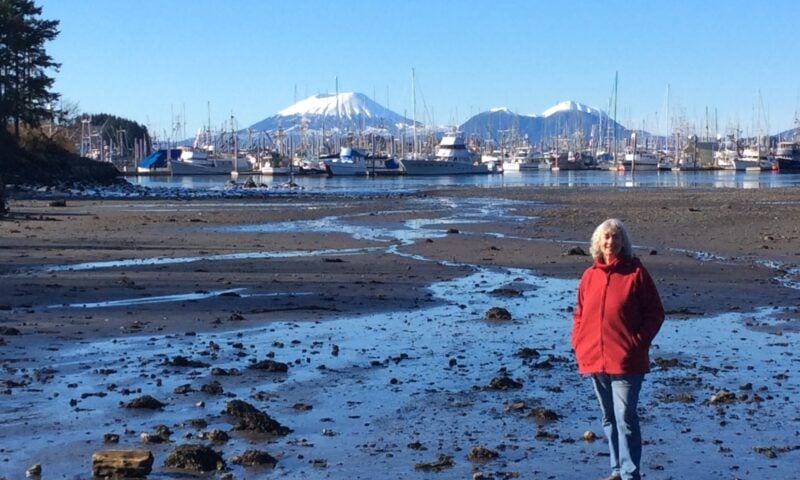 Cheryl Call photo with view of boats and mountains